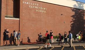 Elementary School Board butts head with parents who want to rehire para-educators.